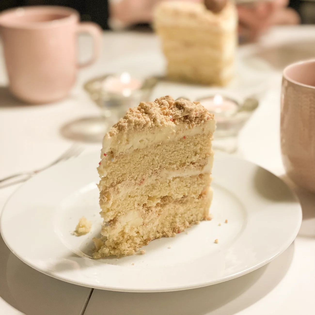 A delicious slice of creamy homemade layer cake.